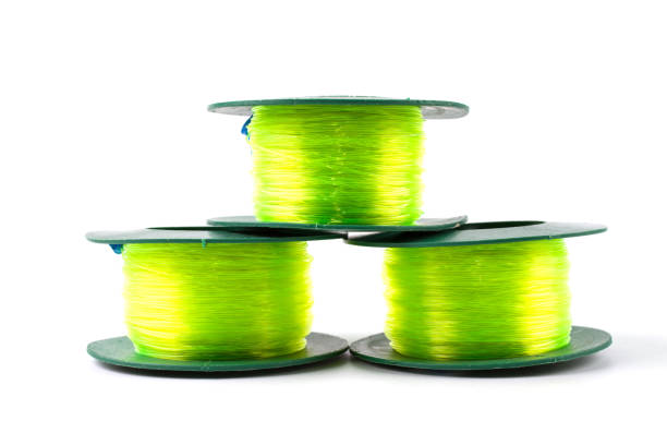 istock Green light Nylon line in green plastic roll. 964278388