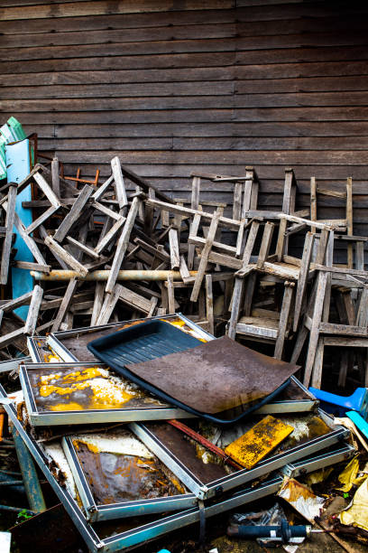 istock Broken vintage wooden chairs with rusty metal in old school 964279040
