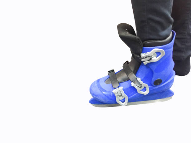 young girl with ice skate shoe isolated on white