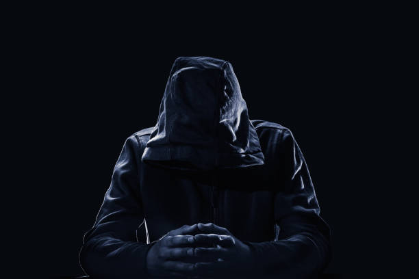 istock Violation of intellectual property rights concept. Hacker in a hood. 964283774