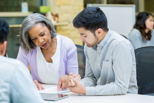 istock Business people participate in staff meeting 964284224