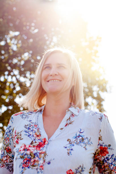 istock Smiling Woman Looking Away 964284334