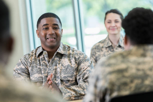 istock Military officer meets with new cadet 964284452