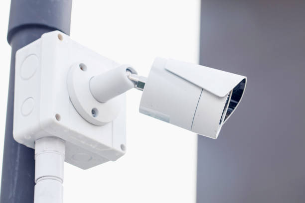 istock Security CCTV camera surveillance system outdoor of house. 964287256