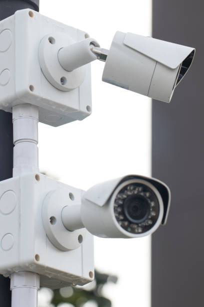 istock Security CCTV camera surveillance system outdoor of house. 964288774