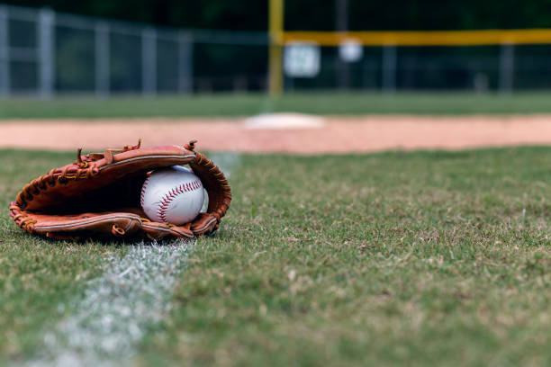 istock Baseball glove on foul line 964300130