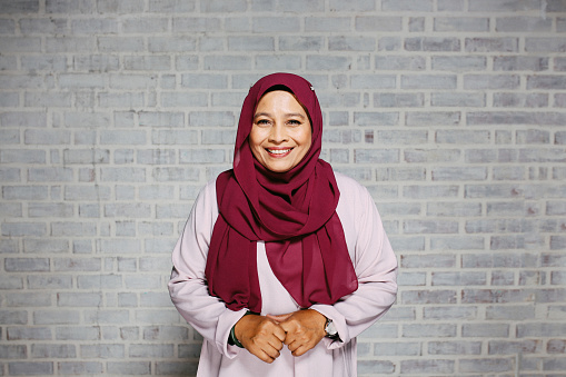 Portrait of a beautiful Asian woman wearing hijab