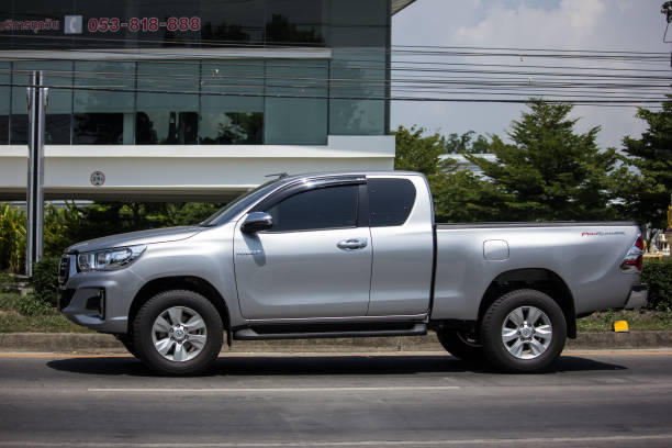 Private Pickup Truck Car New Toyota Hilux Revo  Rocco Chiangmai, Thailand - May 21, 2018: Private Pickup Truck Car New Toyota Hilux Revo  Rocco. On road no.1001, 8 km from Chiangmai city. toyota hilux stock pictures, royalty-free photos & images