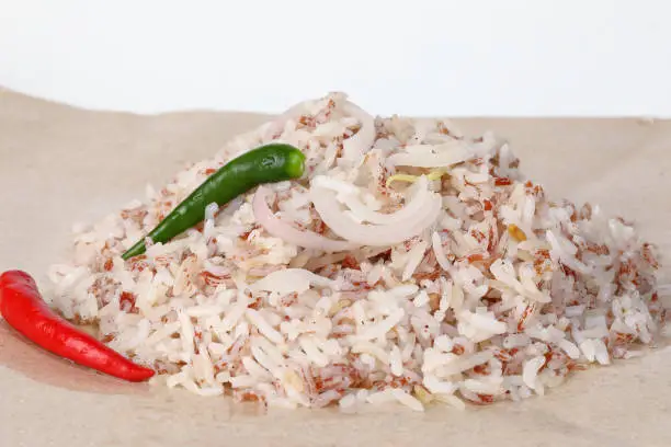 Photo of Nasi dagang mixed unpolished wild rice cooked with coconut milk spiced with onion garlic ginger chilli served with fish or chicken coconut curry