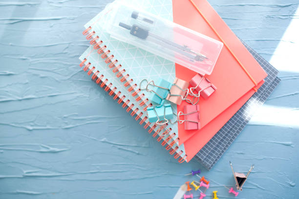 istock Stationery for school and office. Compasses and notebooks. Free space for text. Horizontal photo. Light colors 964342570