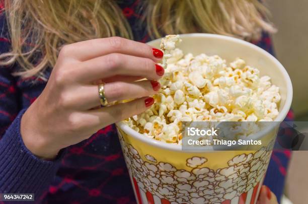 Womans Hand Close Up Picking Up Popcorn Stock Photo - Download Image Now - Popcorn, Movie Theater, Movie