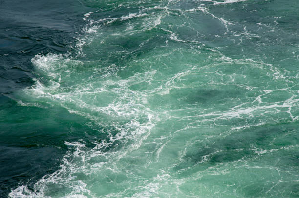 istock sea water with ripples and spray 964347578