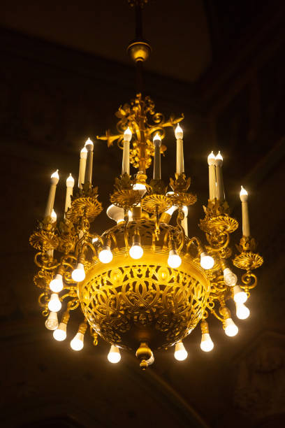 istock Big chandelier with energy saving bulbs at cathedral 964348892