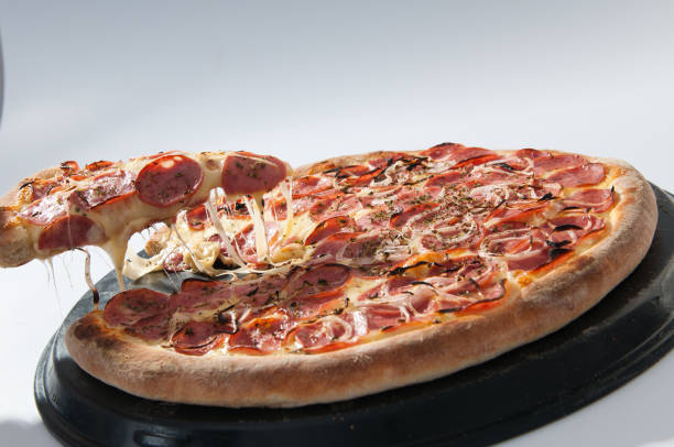 istock Pizza served in slices - Mozzarella pizza with Calabrian and Onion 964348970