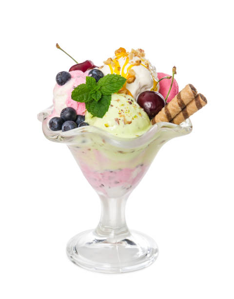 istock Different ice cream balls with fresh berries and wafer sticks in glass vase 964352592
