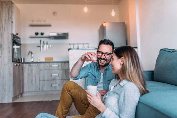 istock Two young people enjoying weekend at home. 964372262