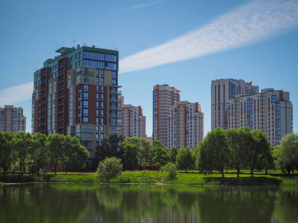 istock City park under blue sky with downtown skyline in the background 964394426