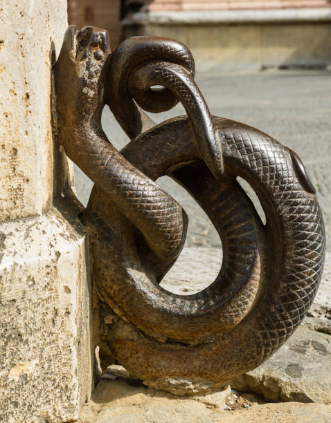 istock Bronze snake street ornament 964399174