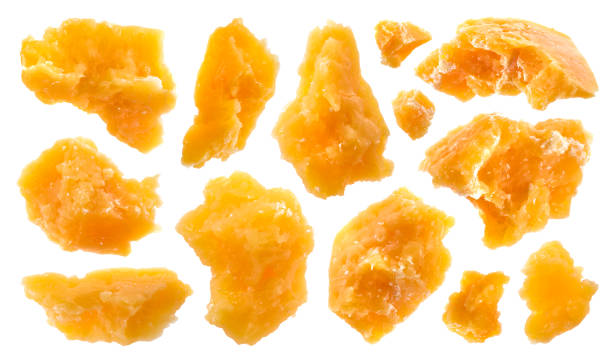 Pieces of parmesan cheese isolated on white background with clipping path