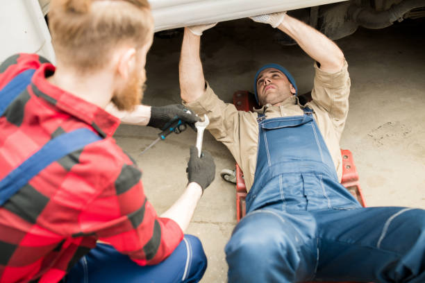 istock Auto Mechanic Under Truck 964438210