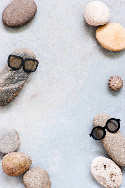 istock Background with two funny characters of stones 964442232