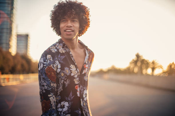 istock Handsome man with curly hair 964449814