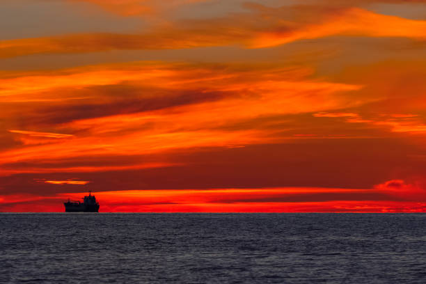 istock Romantic sunset over the sea 964453622