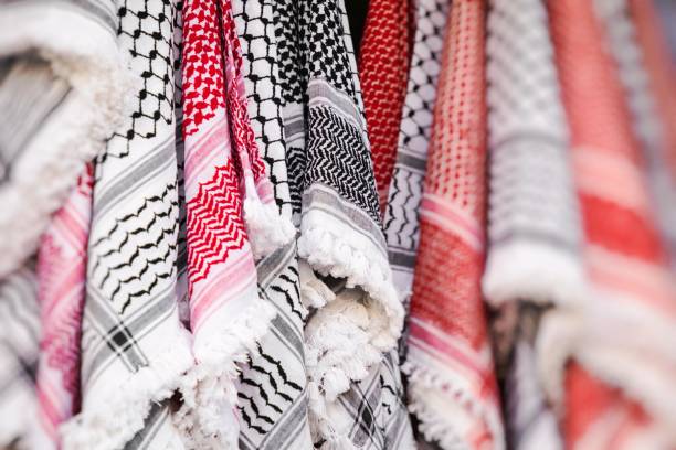 Kufiya man's head scarf popular in the Arab countries. Kufiya man's head scarf popular in the Arab countries. kaffiyeh stock pictures, royalty-free photos & images