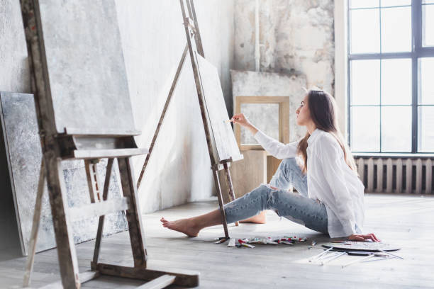 istock Artist painting artwork at workspace. 964455338