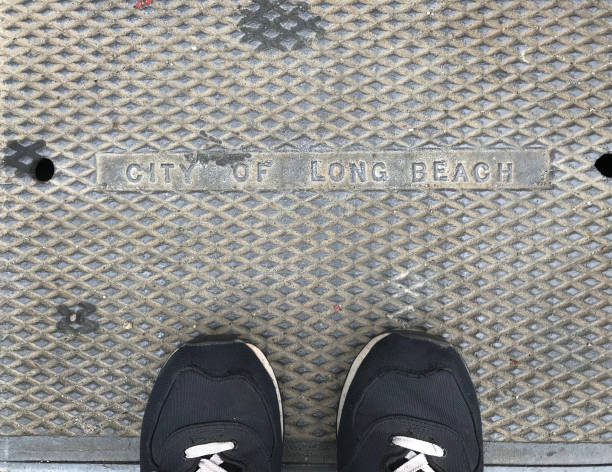 istock Long Beach California sign with shoes 964456098