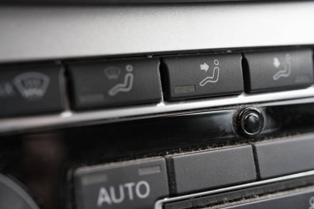istock Closeup view on air conditioning panel in a car. 964461684