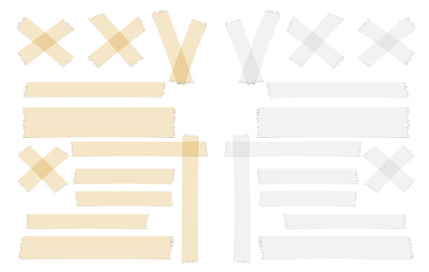 istock White and brown adhesive, sticky, masking, duct tape, paper strips pieces for text on white background 964472920