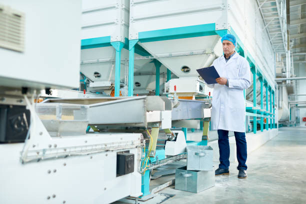 istock Senior Man Working in Modern Factory 964483750