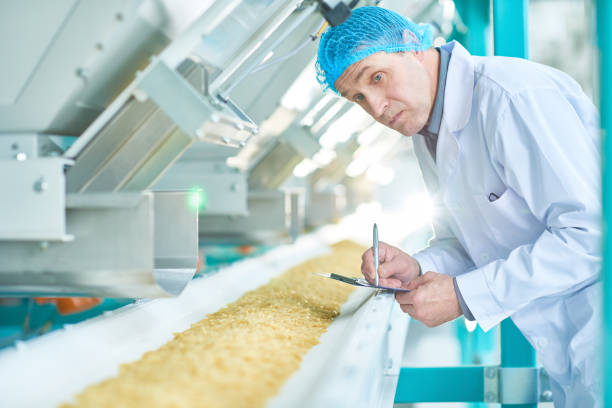 istock Senior Inspector at Food Plant 964483802