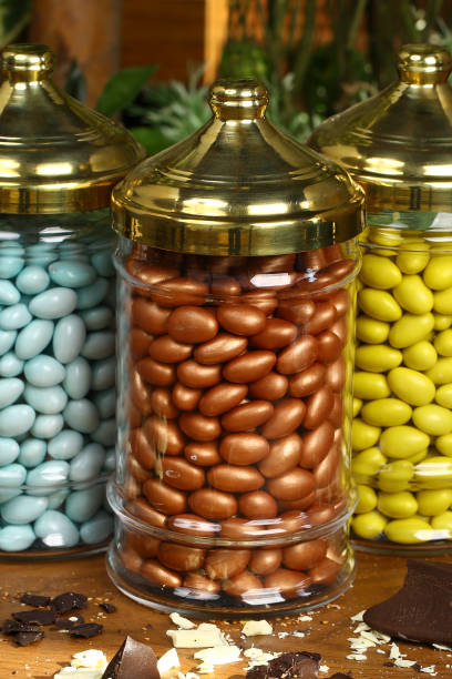 istock Colorful Dragees with nuts in a glass jar 964487460