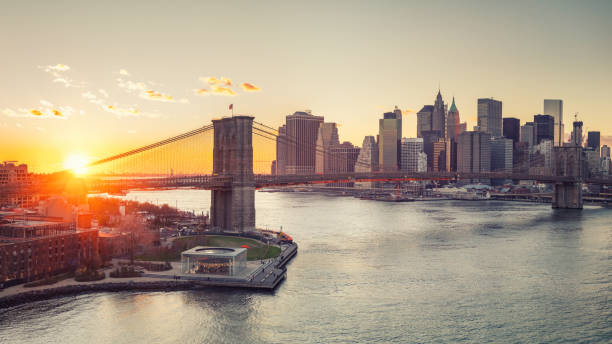 istock Brooklyn bridge and Manhattan at sunset 964536316