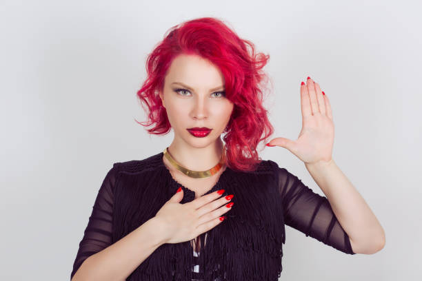 istock Woman witness making a promise or testifies hands gesture 964551184