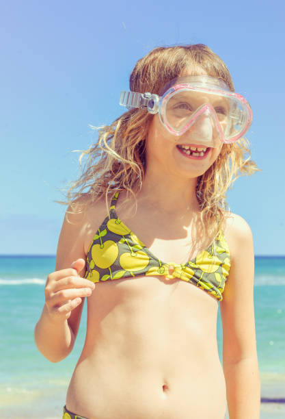 istock Snorkel Mask and the Girl 964579450