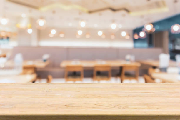 cafe restaurant interior with bokeh light abstract defocused blur background for create montage product display template