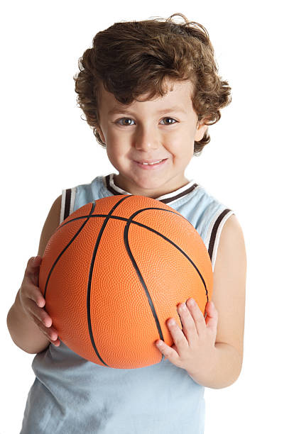 istock adorable boy playing the basketball 96458667