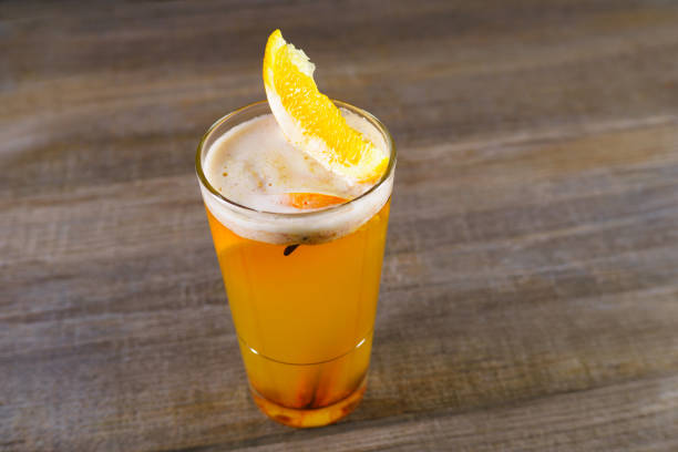 istock Hot apple cider with cinnamon and orange slices 964594762