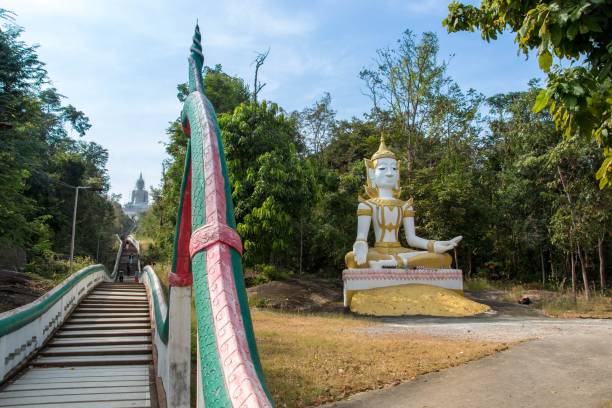 istock Wat Phra Bat Phu Phan, Khon Kaen DEC 09 2017:  Steep steps  (luang-phor Phu Phan Kham, buddha sculpture) a view from Ubolratana dam 964602942