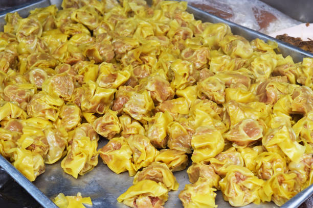 istock Dumplings on a tray in a steaming pot 964627902