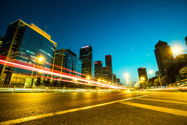 istock City traffic with bus tail light at night 964650116
