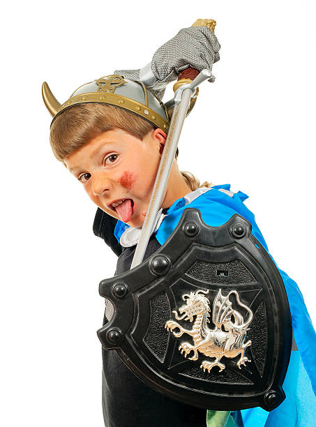 istock Boy in costume knight and with a sword 96465096