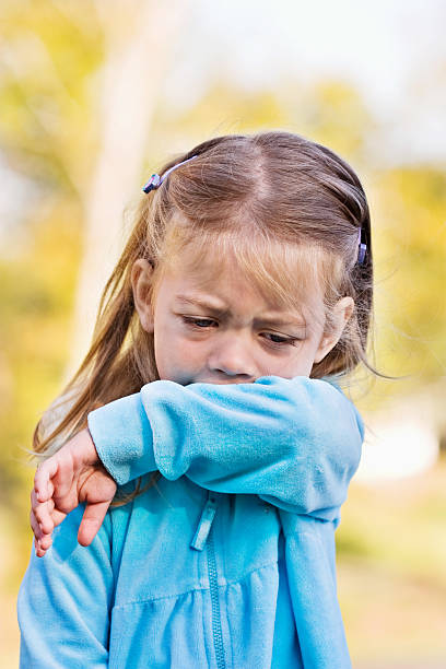 istock Child Coughing or Sneezing into Elbow 96465263