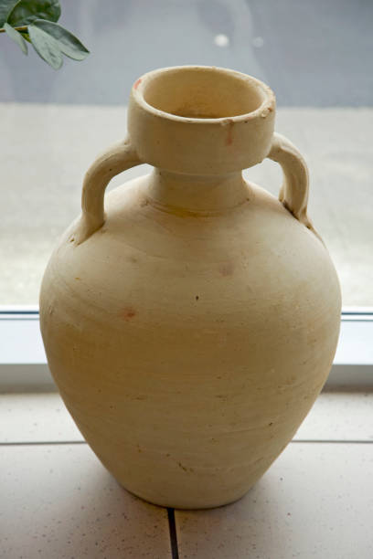 istock The clay vase costs on tiled to a floor 96465981