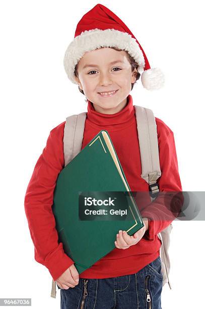 Foto de Criança Com Chapéu De Papai Noel Estudar e mais fotos de stock de Educação - Educação, Foto de estúdio, Natal