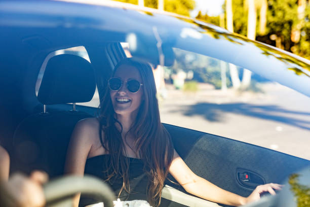 istock Happy Young Women Travellers in a Car 964671674