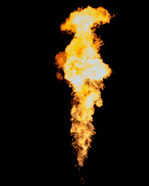 bright isolated flame, fire jet goes from flamethrower - flamethrower imagens e fotografias de stock